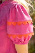 PINK SCALLOPED AND SMOCKED SUEDE RUFFLE TOP-VOY