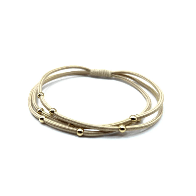 SINGLE WATER PONY 3MM GOLD WATERPROOF HAIR BAND IN BEIGE-Erin Gray