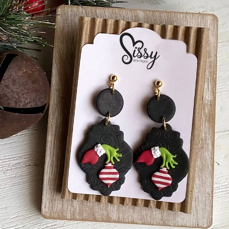 GRINCH HAND WITH ORNAMENT CLAY EARRINGS-Clayhouse Colours